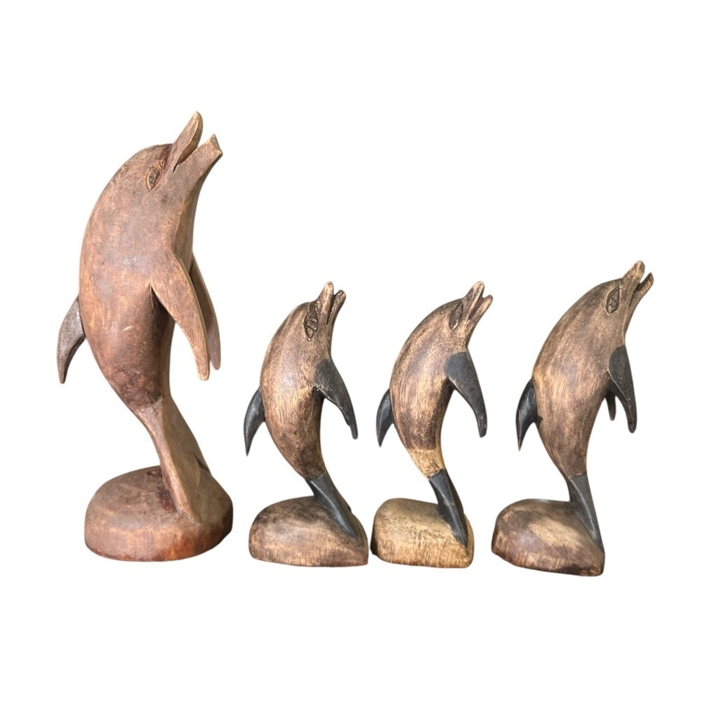 Wood carved dolphin statue